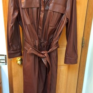 Meet your Posher, Yvonne! Plus size chic and designer women attire. Macy's Nina.